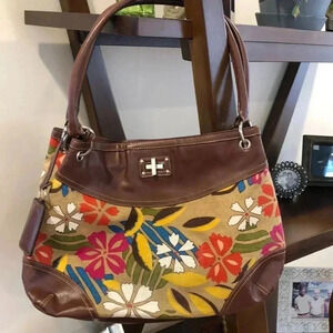 Relic canvas and faux leather trim.  Three separate compartments inside.